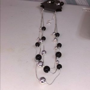 Brand new necklace with matching earrings